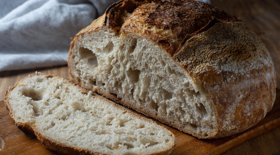 a loaf of sourdough bread with beautiful big air bubbles