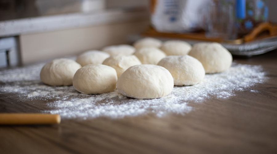 12 Bread Rolls Waiting for the Oven